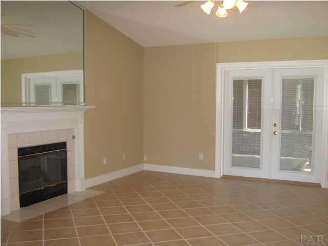 3041 Red Fern Road Cantonment, FL 32533 - Photo 6 of 25 Great room with french doors to florida room that is heated and cooled
