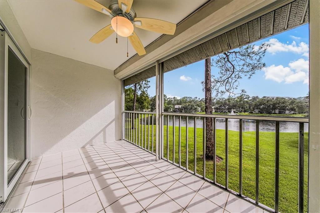 230 Timber Lake Circle, Unit C204 Naples, FL 34104 - Photo 24 of 30 a view of a balcony with lake view