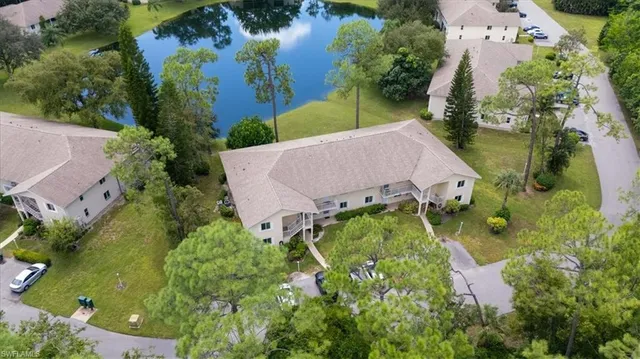 a view of a house with backyard porch and garden
