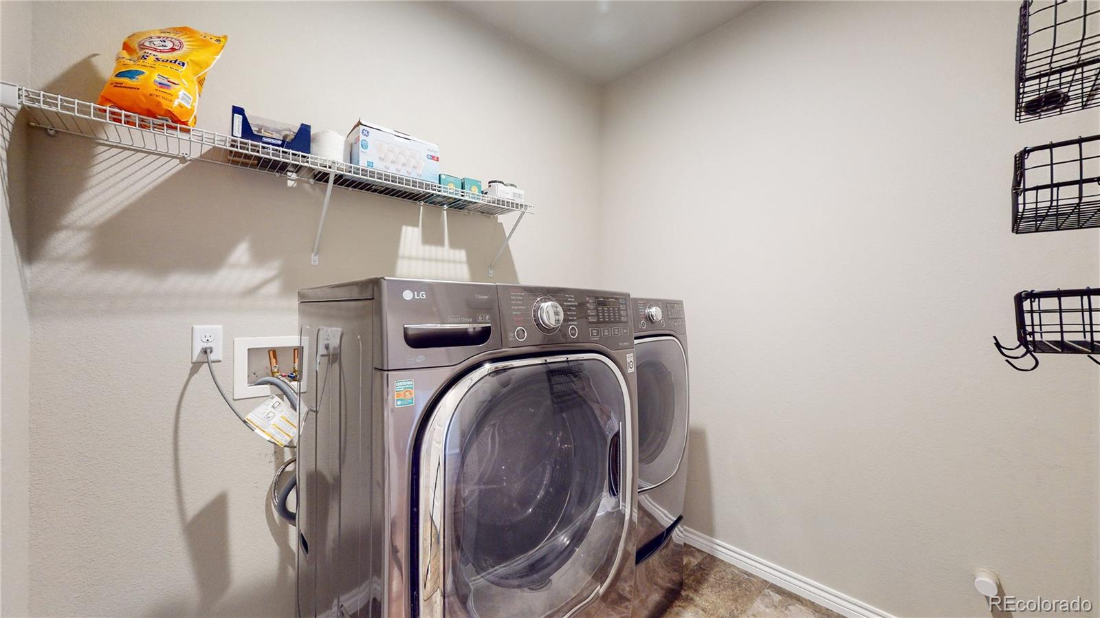 12449 Carmel Ridge Road Colorado Springs, CO 80921 - Photo 39 of 40 a utility room with dryer and washer