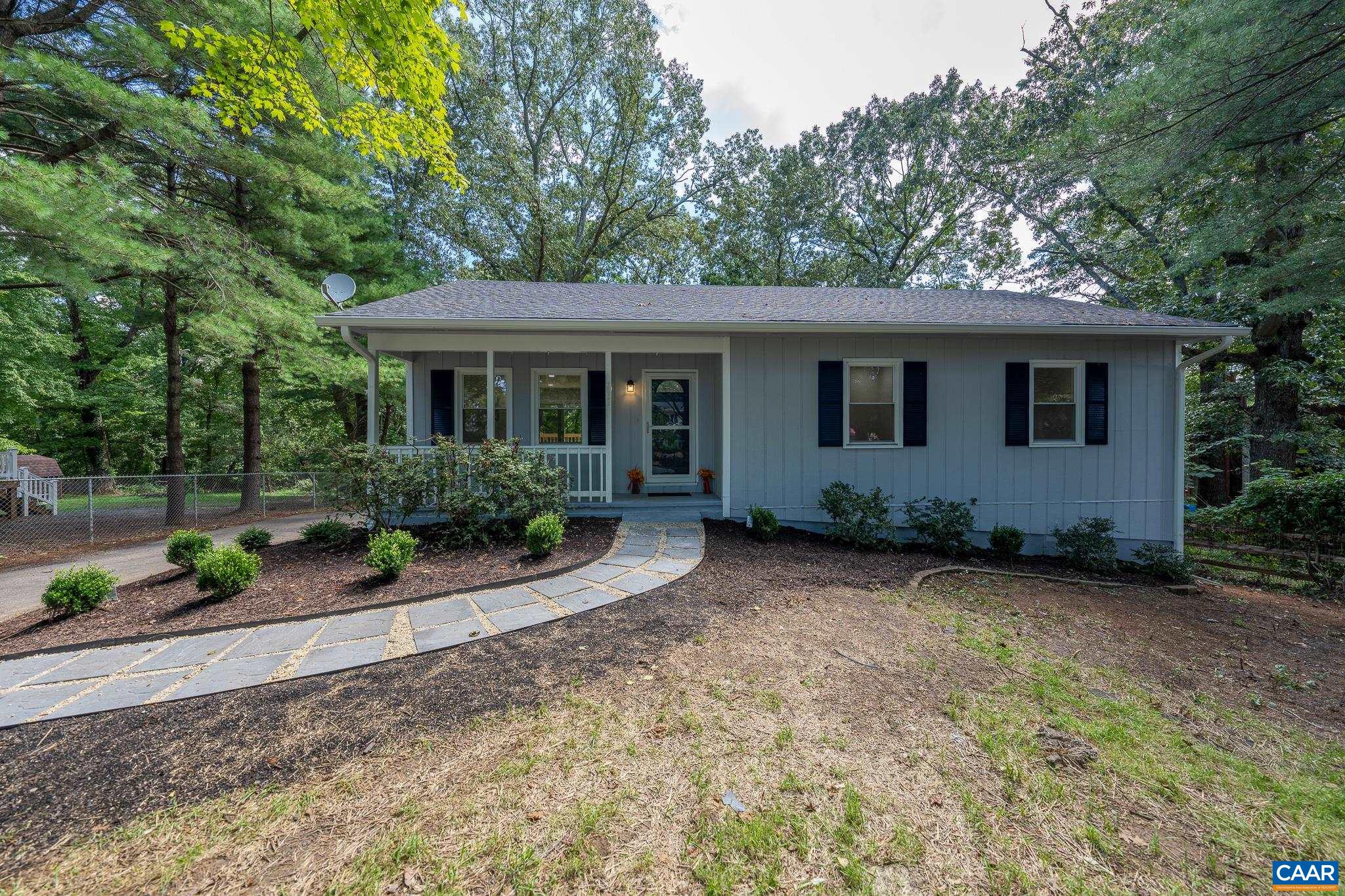 1861 Woodburn Road Charlottesville, VA 22901 - Photo 1 of 42 front view of house with a yard