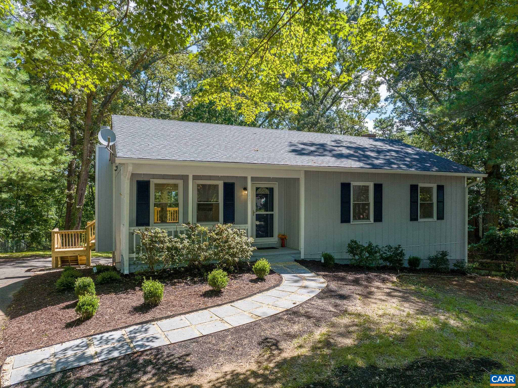 1861 Woodburn Road Charlottesville, VA 22901 - Photo 38 of 42 a front view of a house with a garden