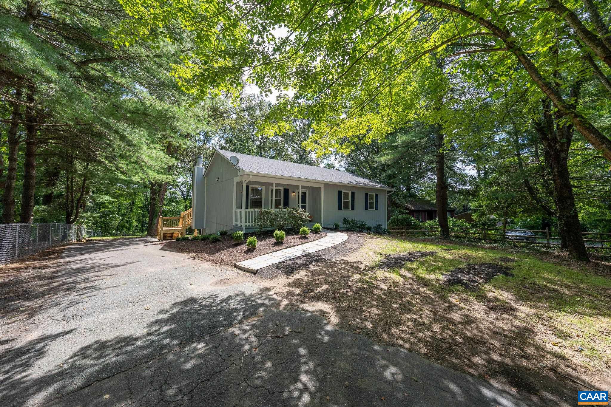 1861 Woodburn Road Charlottesville, VA 22901 - Photo 6 of 42 a view of a house with backyard and sitting area