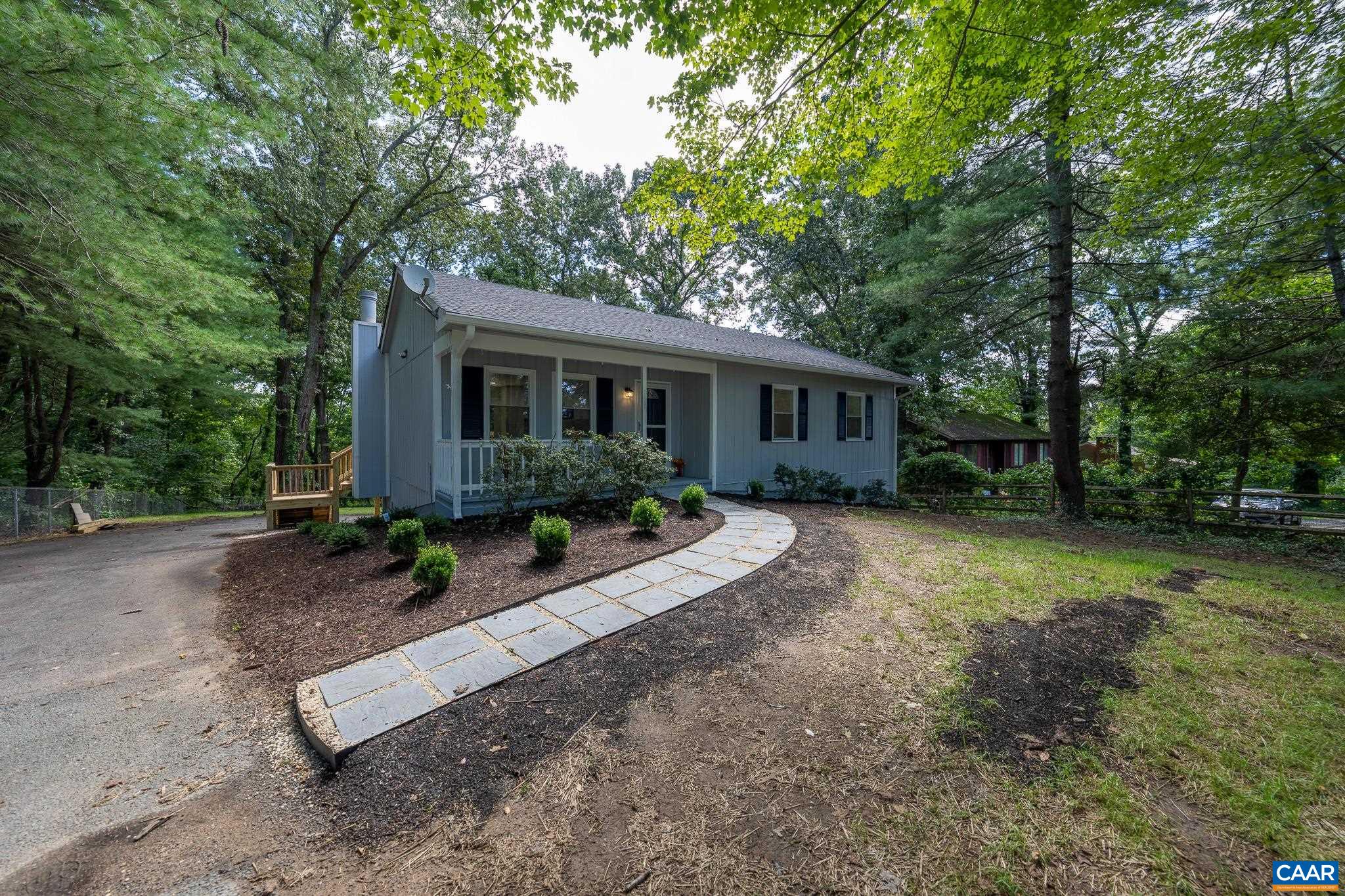 1861 Woodburn Road Charlottesville, VA 22901 - Photo 7 of 42 a front view of house with yard and green space