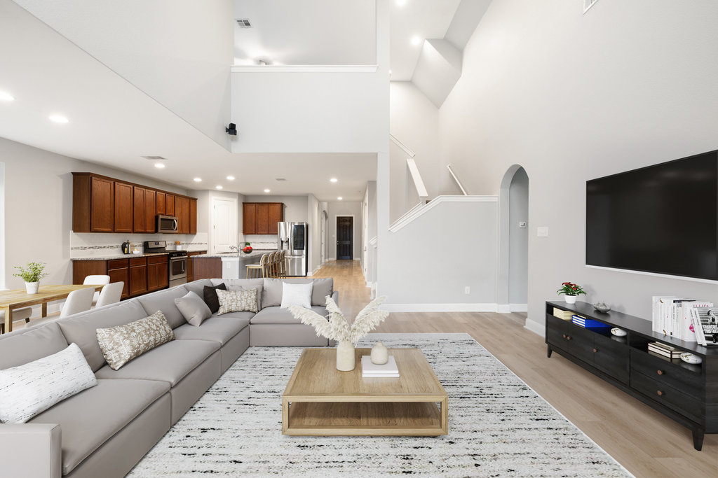 5208 Anaheim Avenue Pflugerville, TX 78660 - Photo 13 of 38 a living room with furniture and a flat screen tv