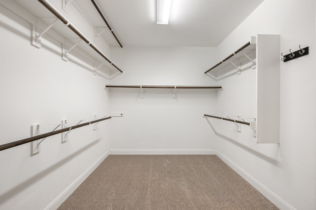 5208 Anaheim Avenue Pflugerville, TX 78660 - Photo 21 of 38 a view of an empty walk in closet