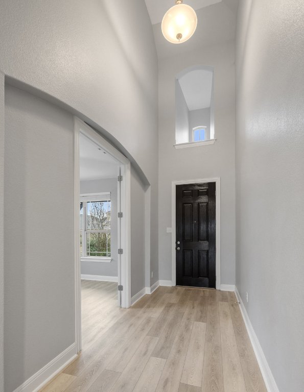 5208 Anaheim Avenue Pflugerville, TX 78660 - Photo 4 of 38 an empty room with closet and a mirror