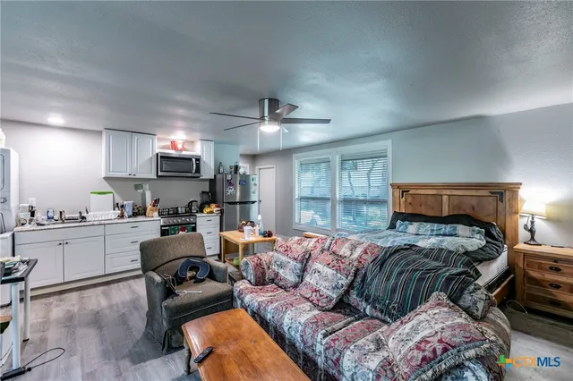 a bedroom with furniture and a couch