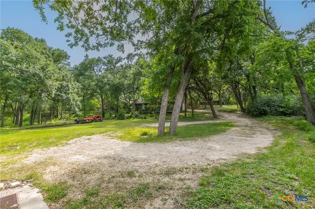 a view of backyard with green space
