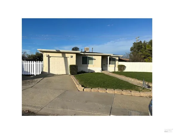 a black and white photo of a house