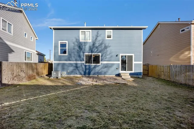 a brick house with a yard