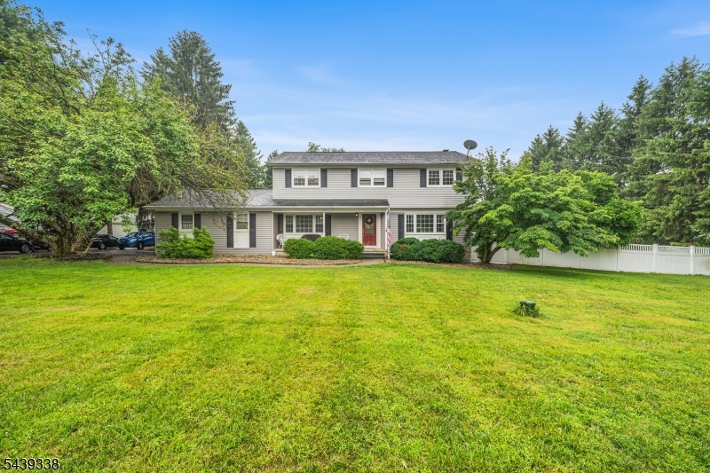 1 Oak Grove Road Flemington, NJ 08822 - Photo 1 of 29 a front view of a house with a yard