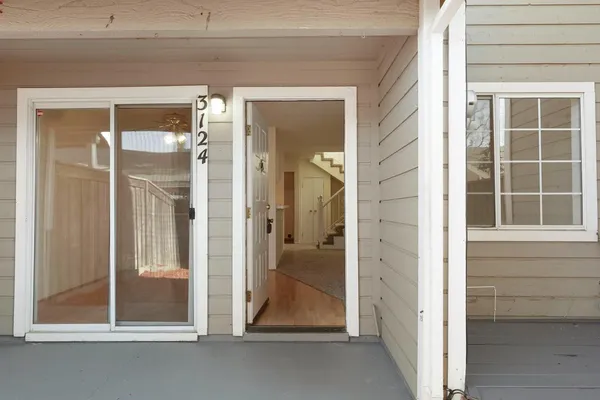 a view of a bathroom with a glass door
