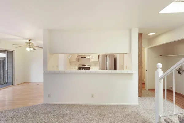 a view of kitchen with wooden floor