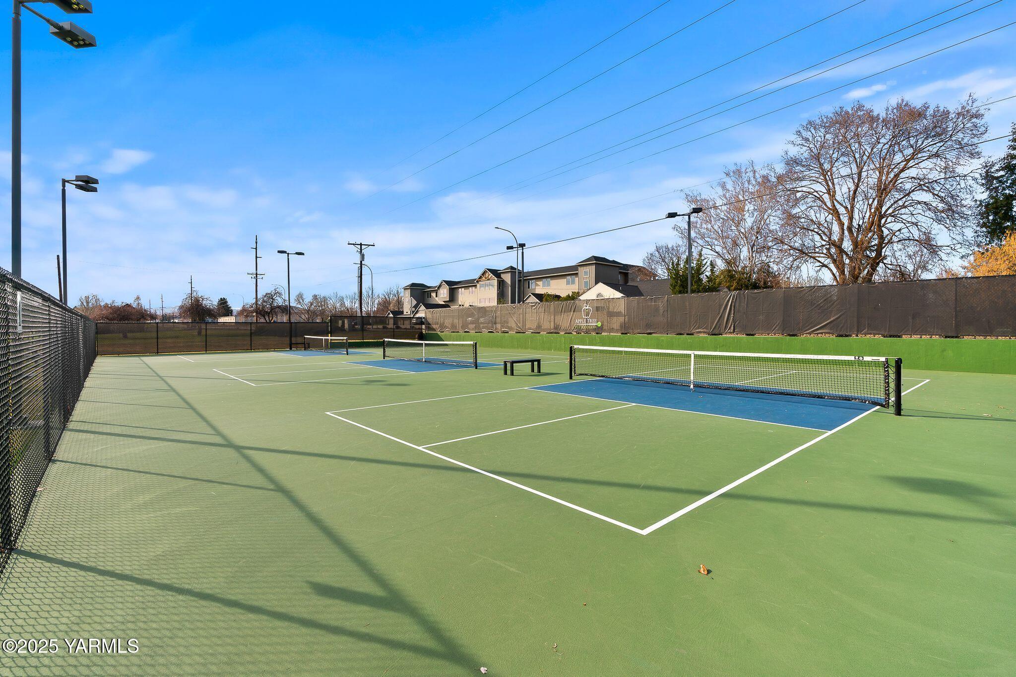 9150 Occidental Road, Unit 8 Yakima, WA 98903 - Photo 34 of 41 Picklball with the neighbors