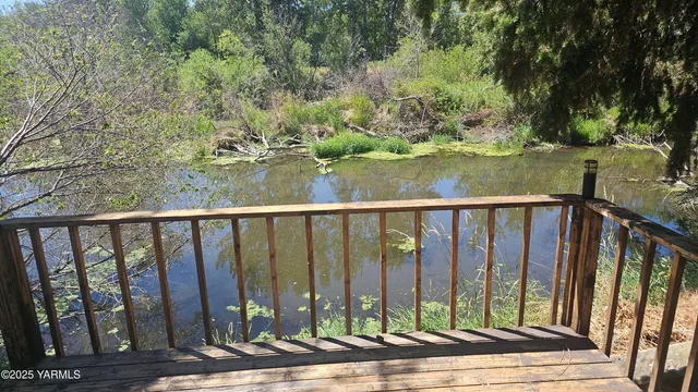 a view of a balcony with lake view