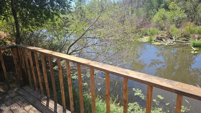 a view of a wooden chairs and floor