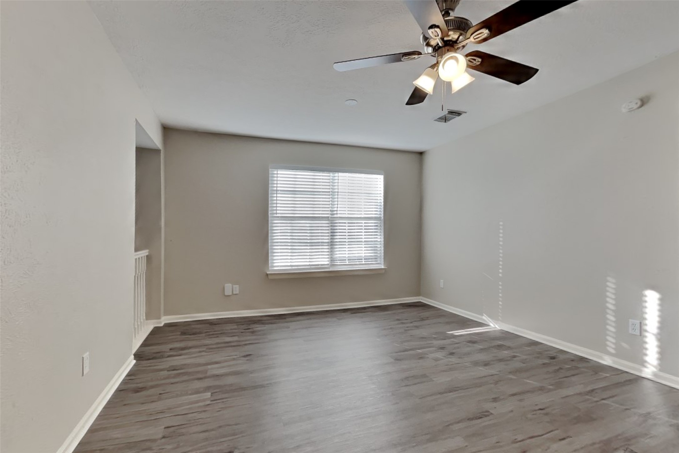 3602 Appalachian Trail Houston, TX 77345 - Photo 17 of 21 wooden floor in an empty room with a window