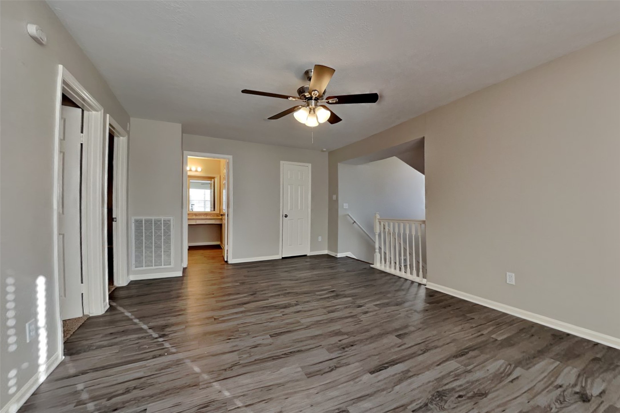 3602 Appalachian Trail Houston, TX 77345 - Photo 18 of 21 wooden floor in an empty room with a window
