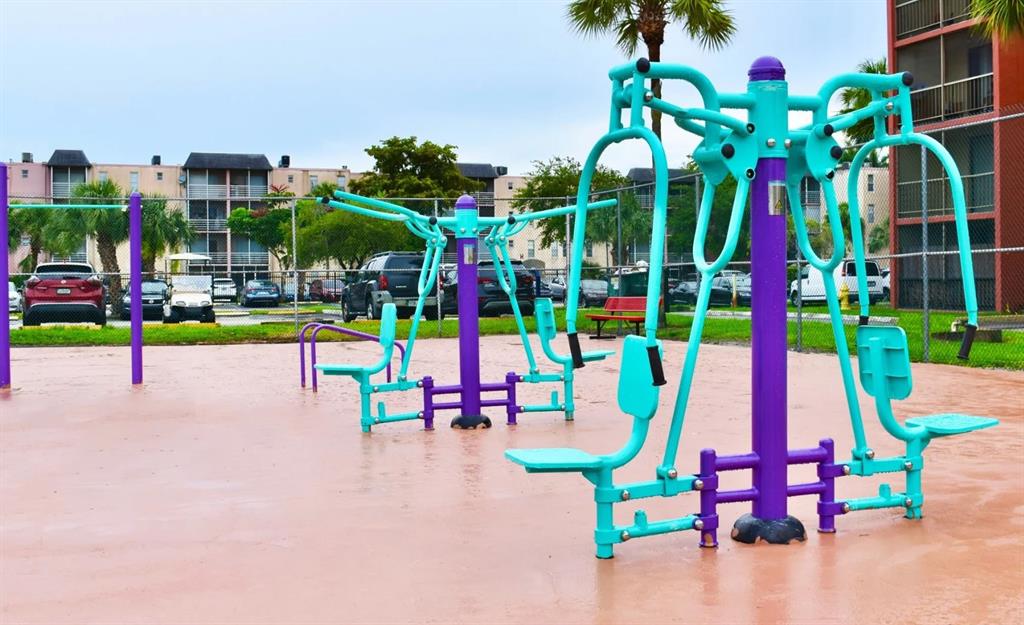 2580 Northwest 56th Avenue, Unit 700420 Lauderhill, FL 33313 - Photo 12 of 16 a view of play ground with pool