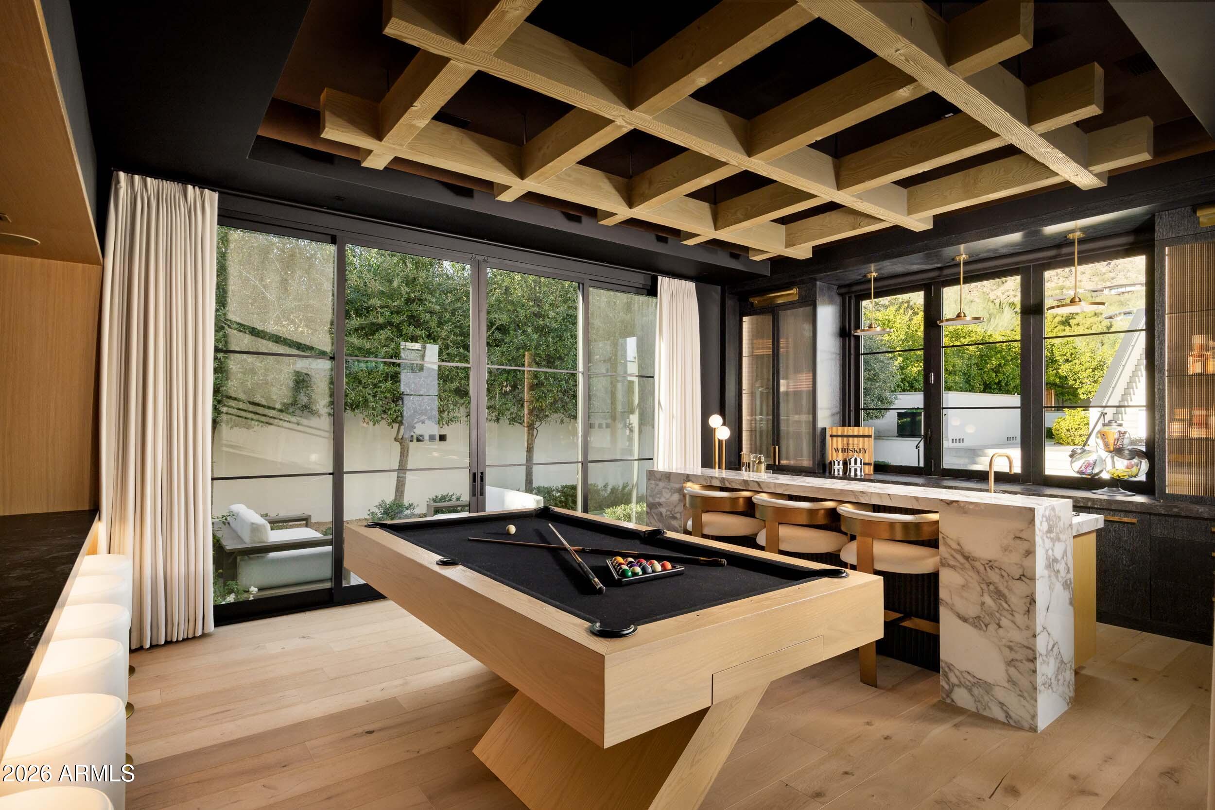 6800 North Mummy Mountain Road Paradise Valley, AZ 85253 - Photo 12 of 61 a kitchen with a stove and a sink