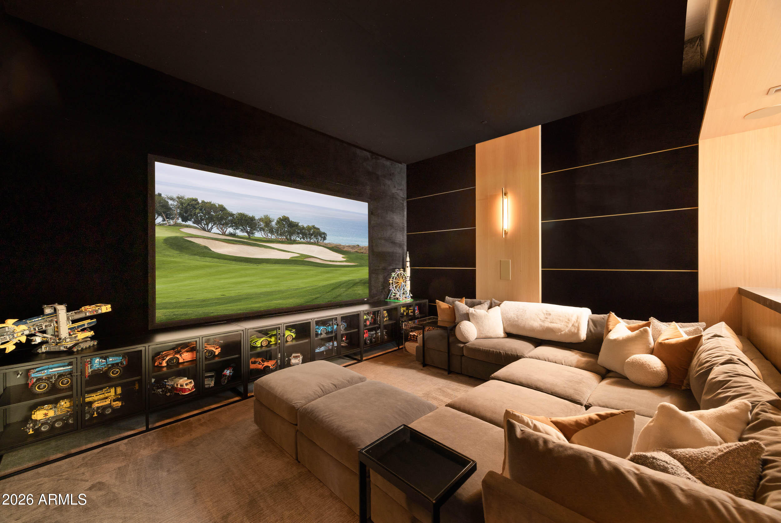 6800 North Mummy Mountain Road Paradise Valley, AZ 85253 - Photo 14 of 61 a living room with furniture and a flat screen tv
