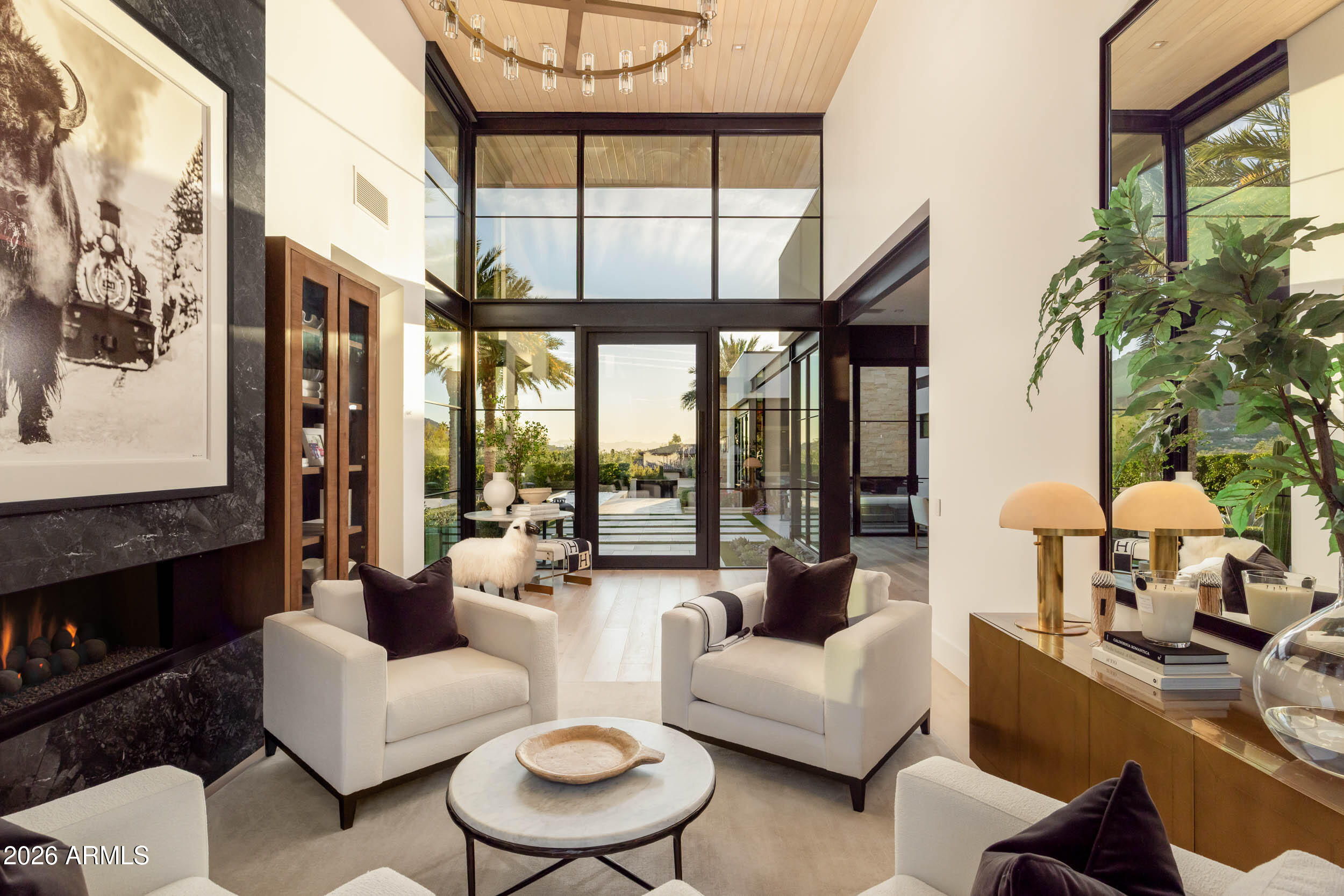 6800 North Mummy Mountain Road Paradise Valley, AZ 85253 - Photo 17 of 61 a living room with furniture and a large window