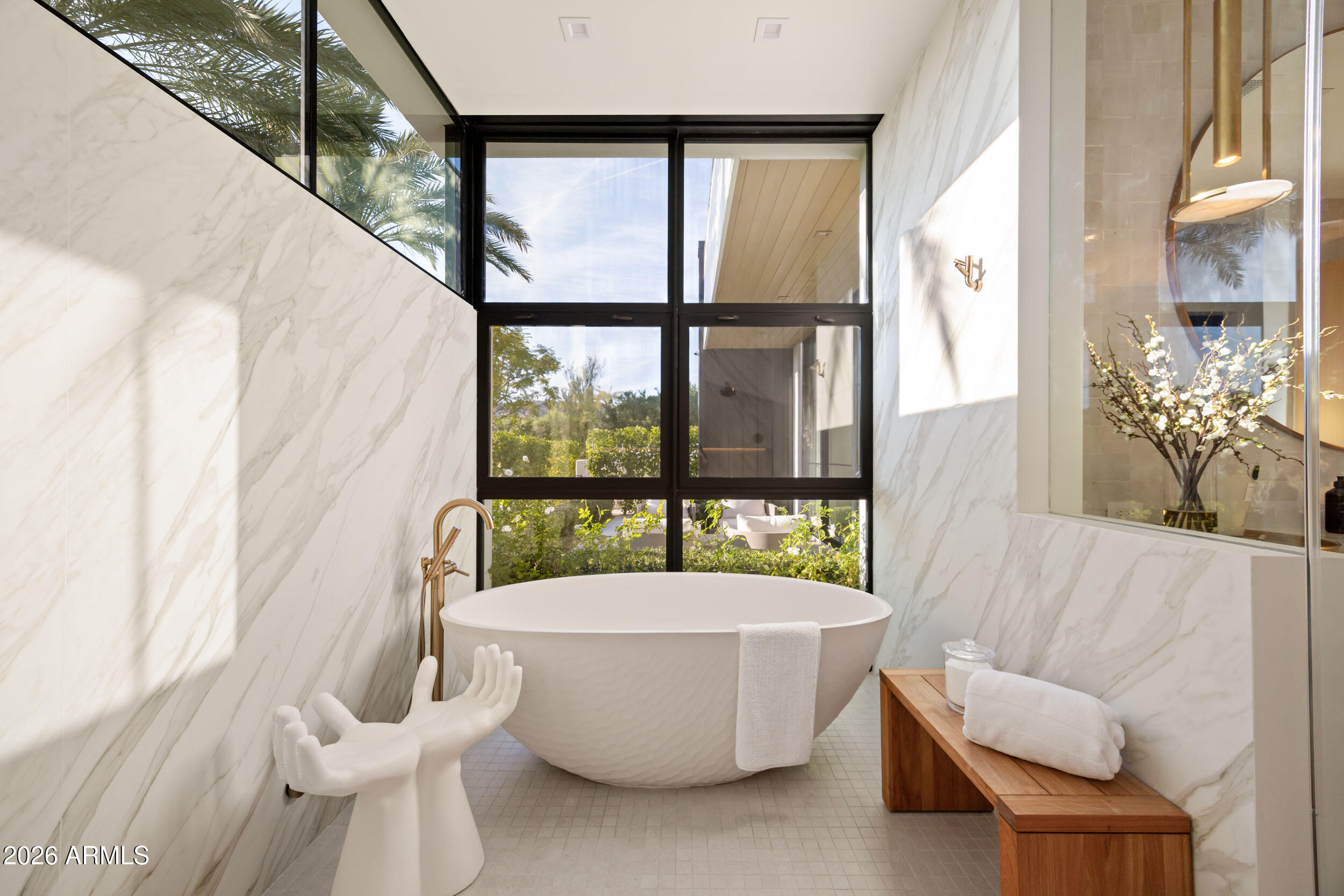 6800 North Mummy Mountain Road Paradise Valley, AZ 85253 - Photo 23 of 61 a living room with furniture and a large window
