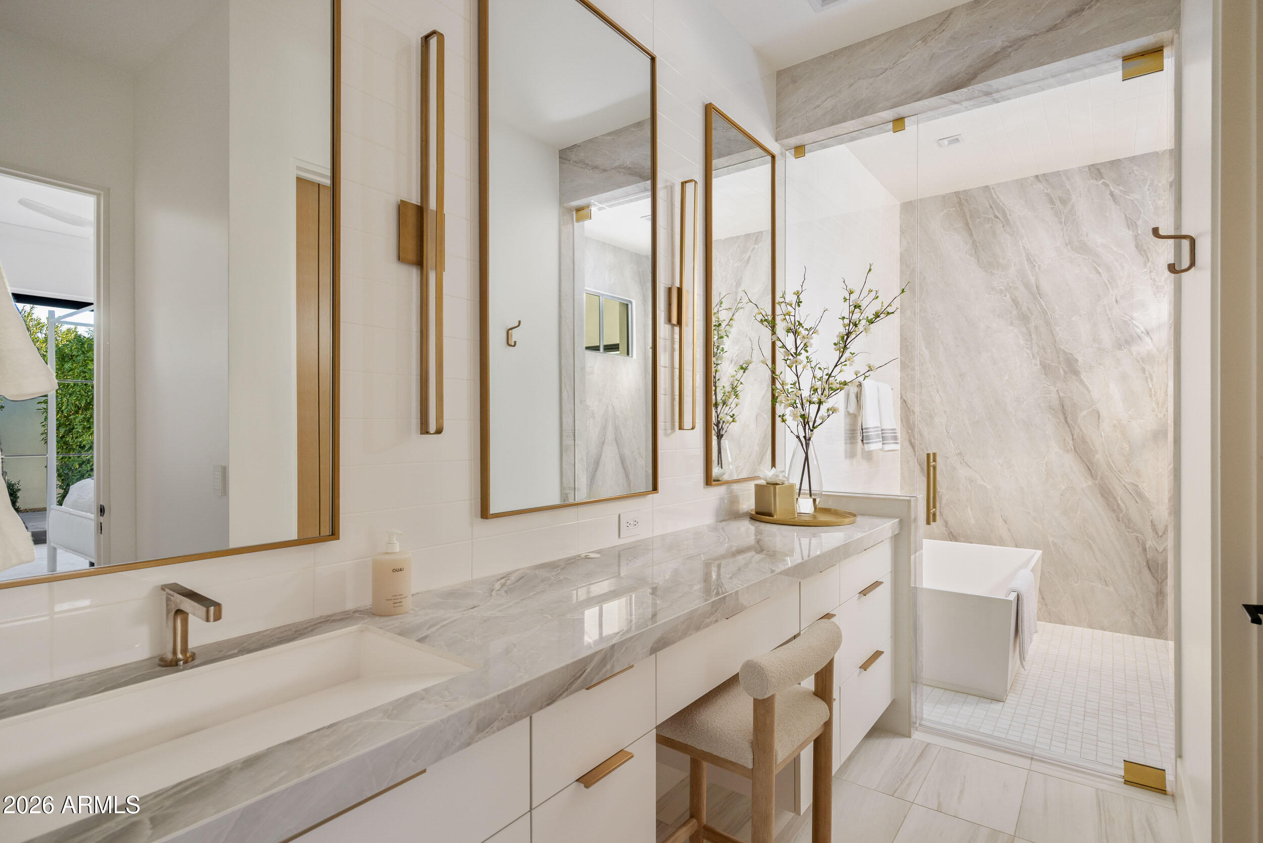 6800 North Mummy Mountain Road Paradise Valley, AZ 85253 - Photo 32 of 61 a bathroom with a granite countertop sink and a mirror