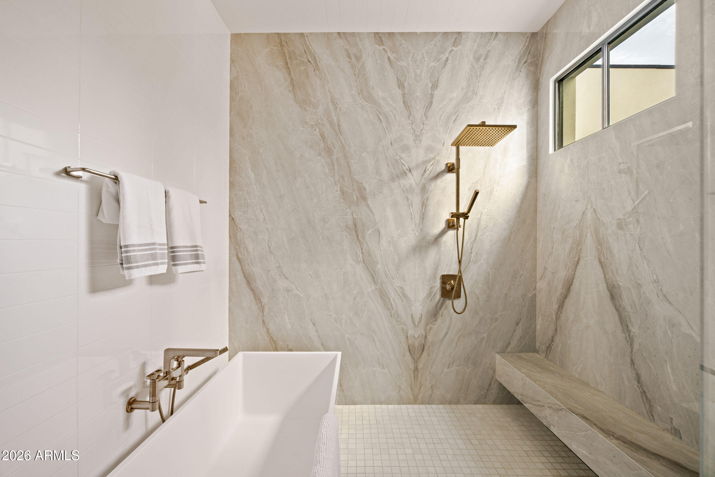 6800 North Mummy Mountain Road Paradise Valley, AZ 85253 - Photo 33 of 61 a bathroom with a bathtub and shower