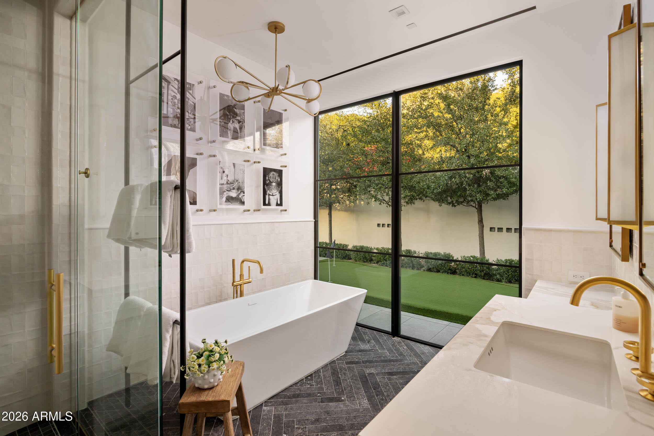 6800 North Mummy Mountain Road Paradise Valley, AZ 85253 - Photo 44 of 61 a view of a living room and a floor to ceiling window