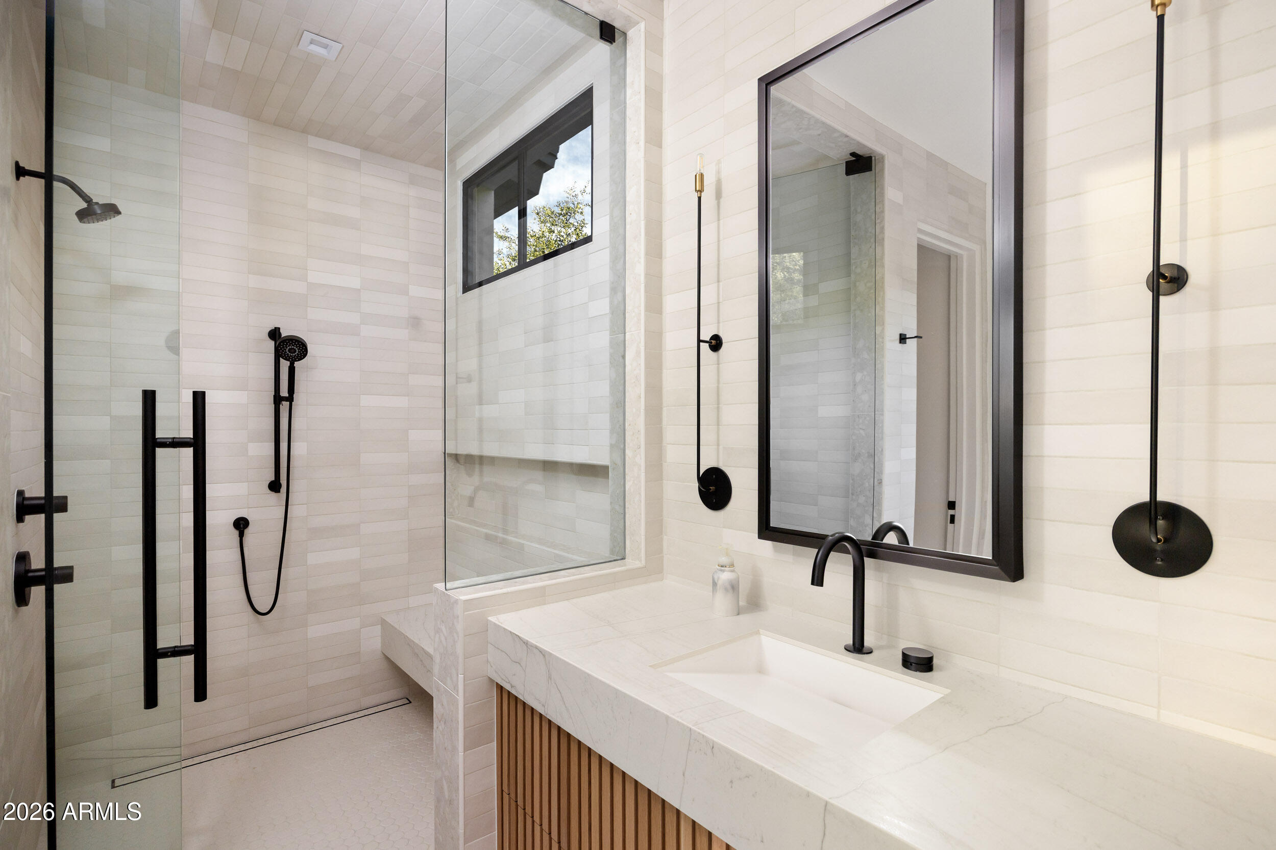 6800 North Mummy Mountain Road Paradise Valley, AZ 85253 - Photo 45 of 61 a bathroom with a sink and a mirror