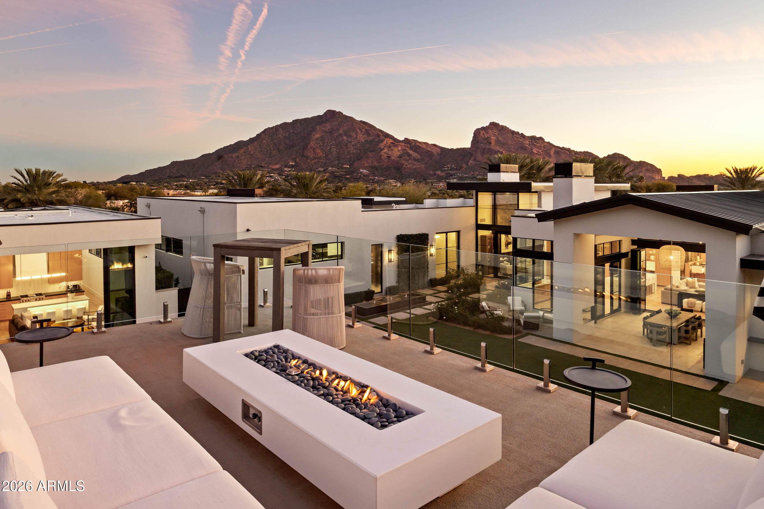 6800 North Mummy Mountain Road Paradise Valley, AZ 85253 - Photo 53 of 61 a view of a chairs and table in a patio