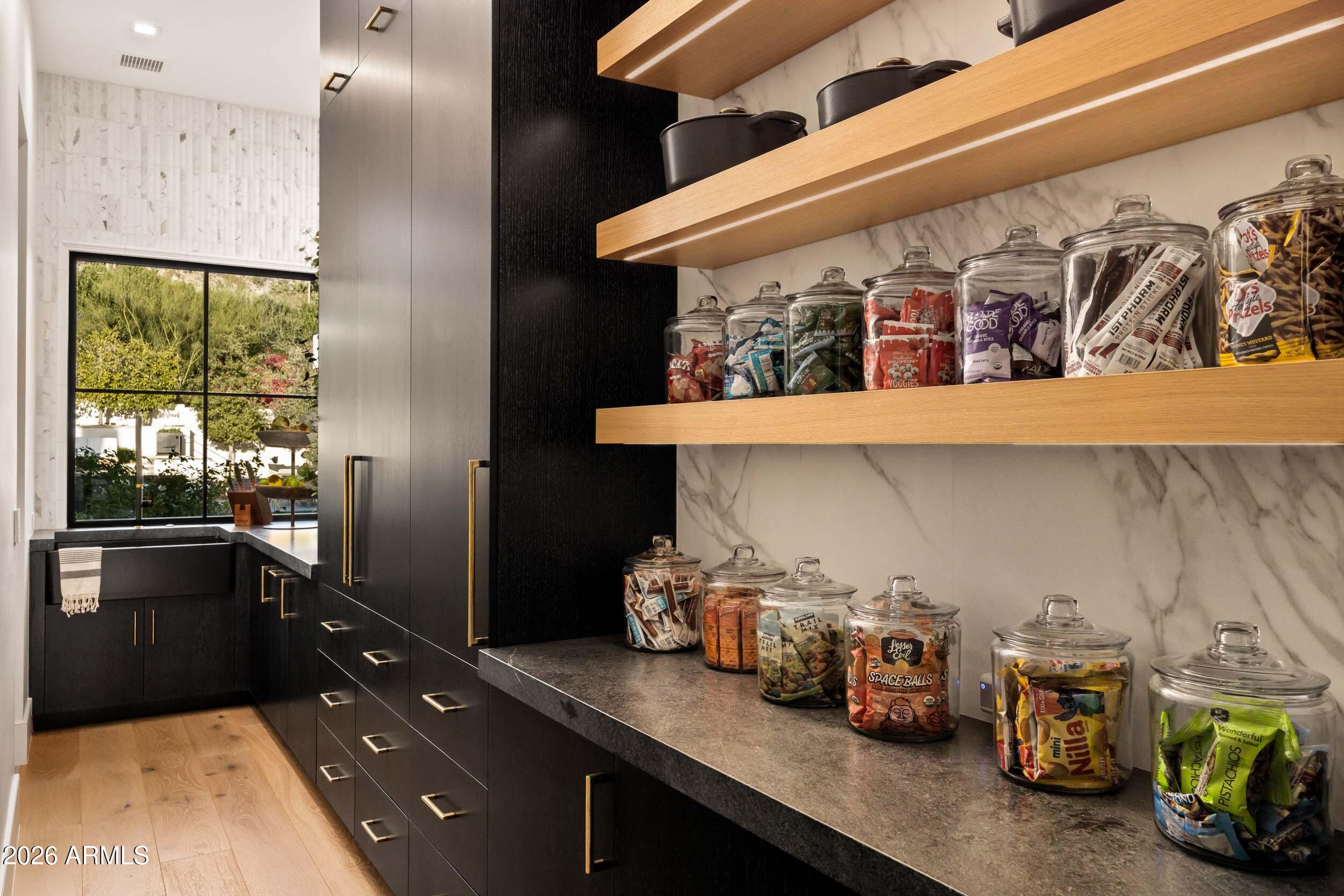 6800 North Mummy Mountain Road Paradise Valley, AZ 85253 - Photo 9 of 61 a kitchen with lots of counter top space