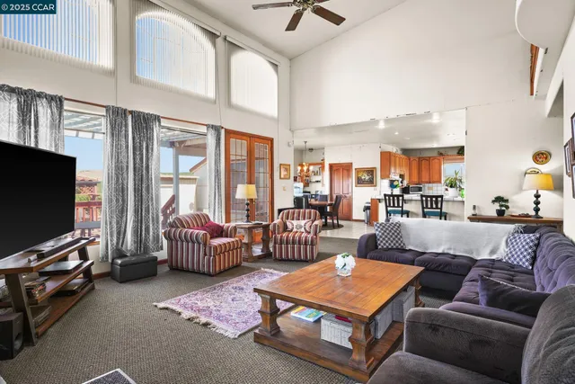 a kitchen with sink a stove and cabinets