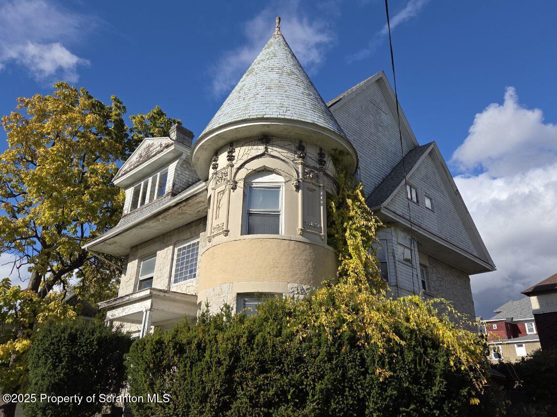 1021 Richmont Street Scranton, PA 18509 - Photo 1 of 42 a view of a house with a garden