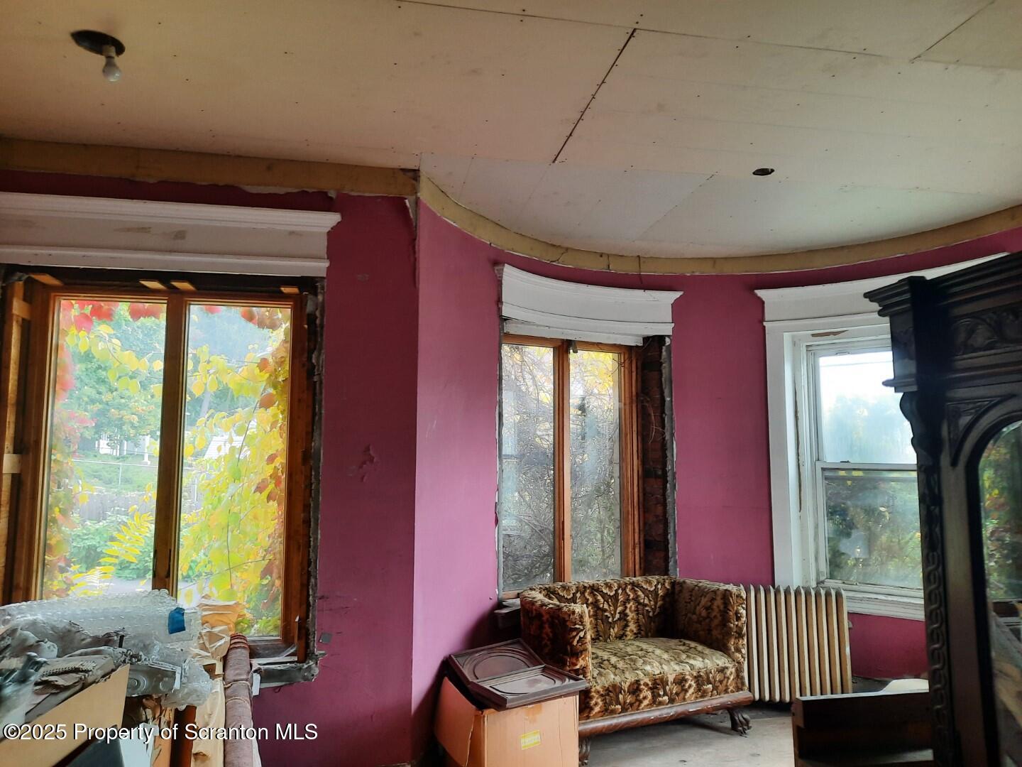 1021 Richmont Street Scranton, PA 18509 - Photo 11 of 42 a living room with furniture and a large window