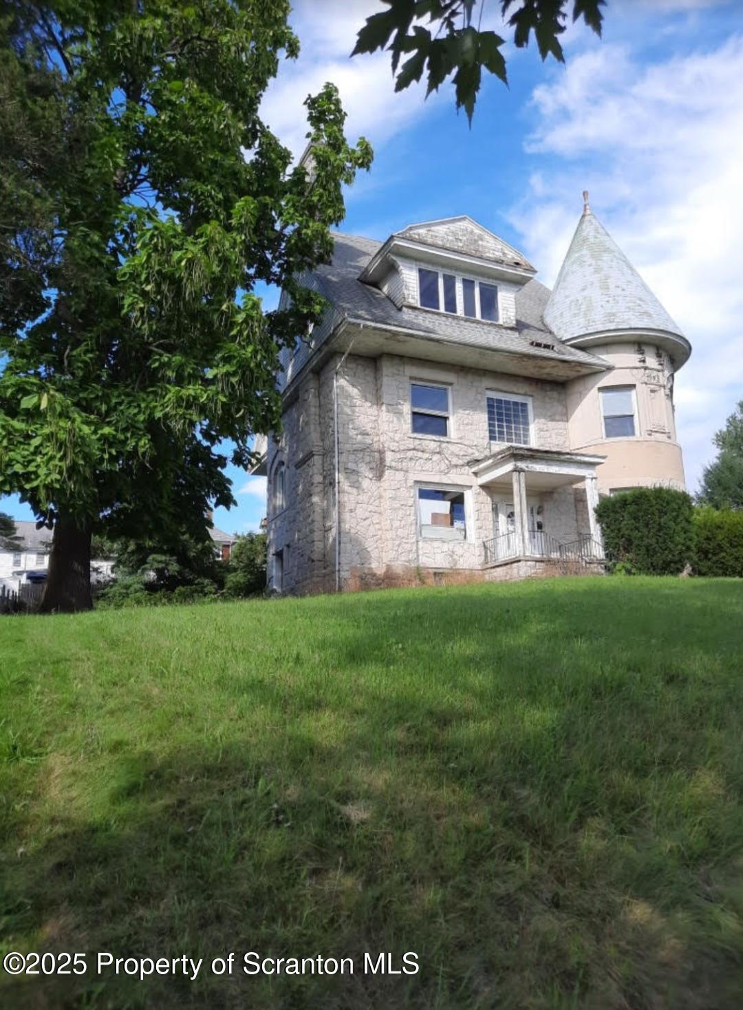 1021 Richmont Street Scranton, PA 18509 - Photo 12 of 42 a view of a front of a house with a yard