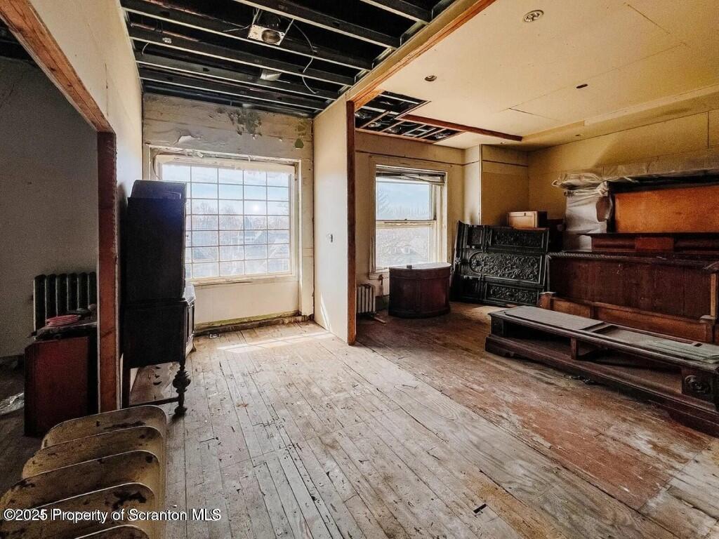 1021 Richmont Street Scranton, PA 18509 - Photo 19 of 42 a view of livingroom with furniture and a flat screen tv