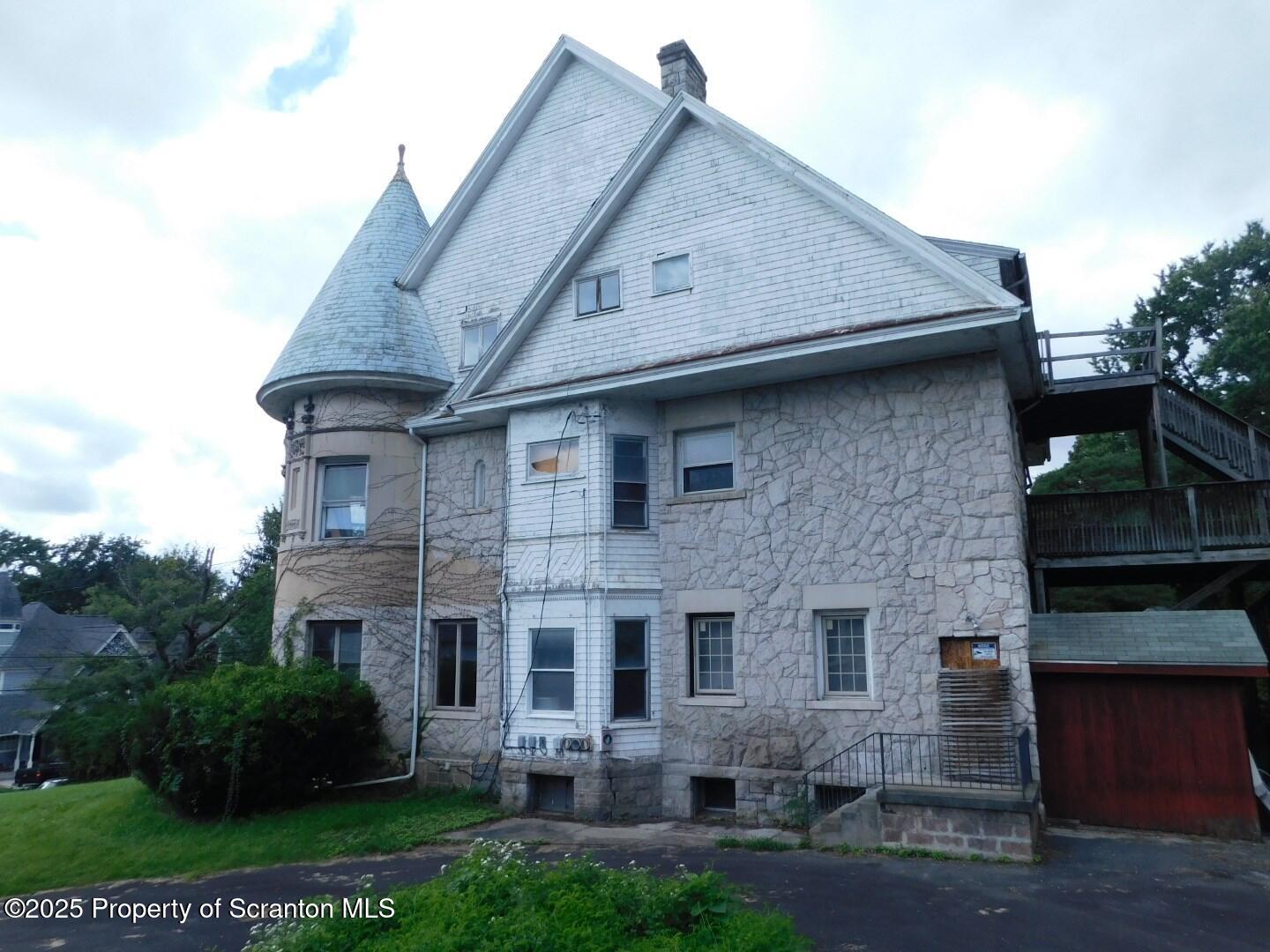 1021 Richmont Street Scranton, PA 18509 - Photo 4 of 42 a front view of a house with garden