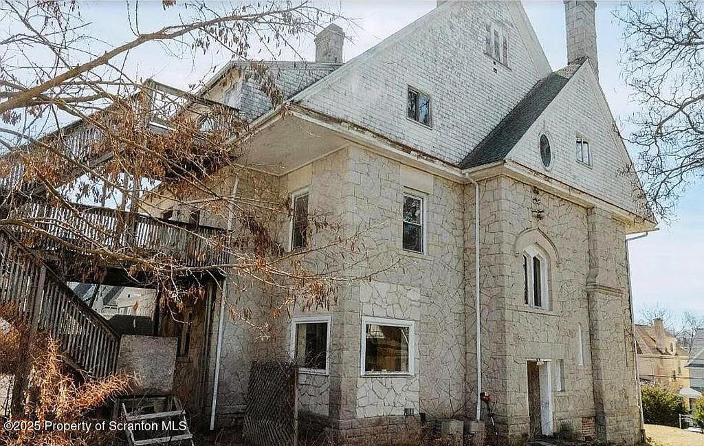 1021 Richmont Street Scranton, PA 18509 - Photo 6 of 42 a aerial view of a residential apartment building with a yard