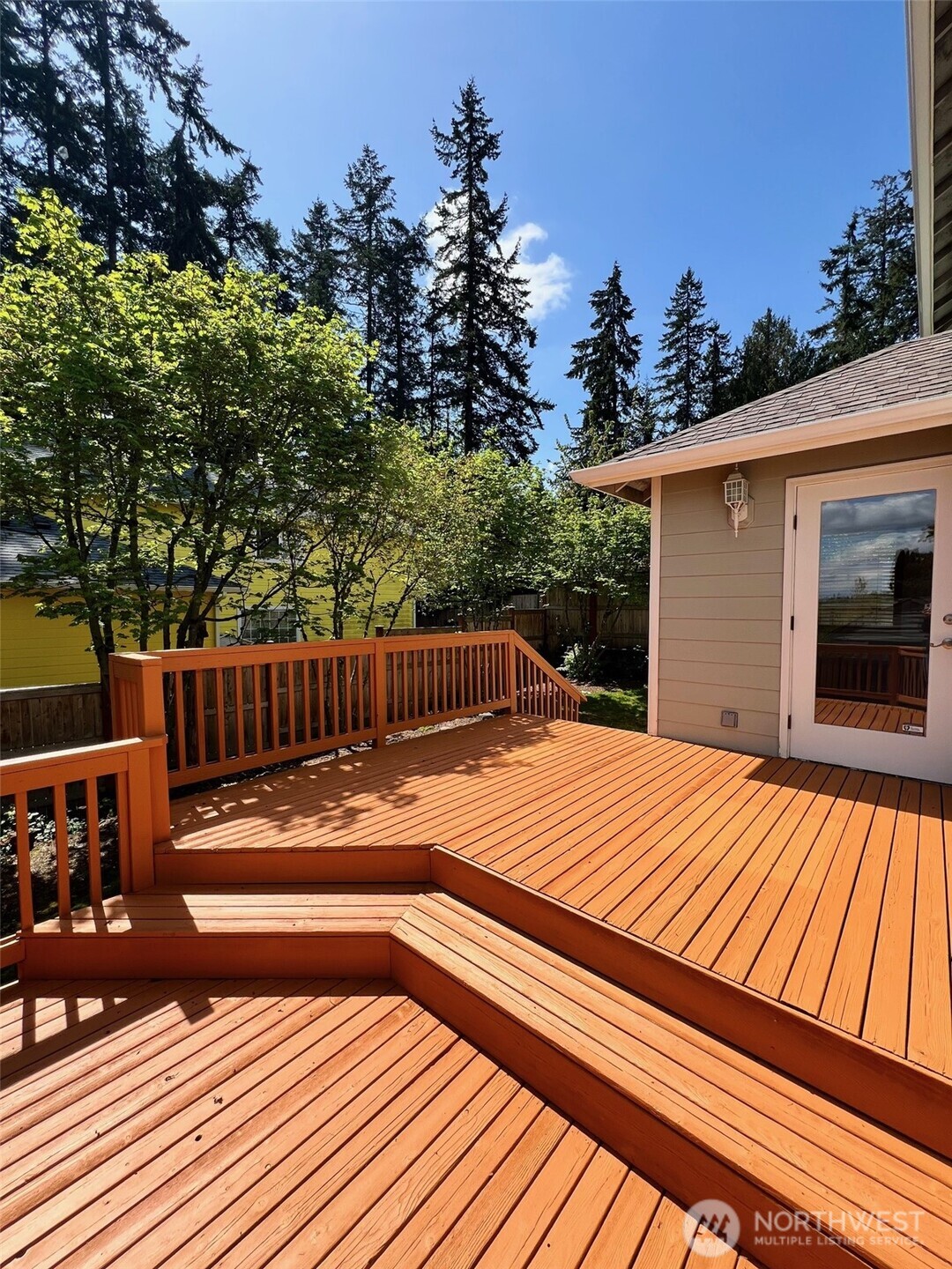 132 170th Place Southeast Bothell, WA 98012 - Photo 21 of 27 a terrace view with sitting space and trees