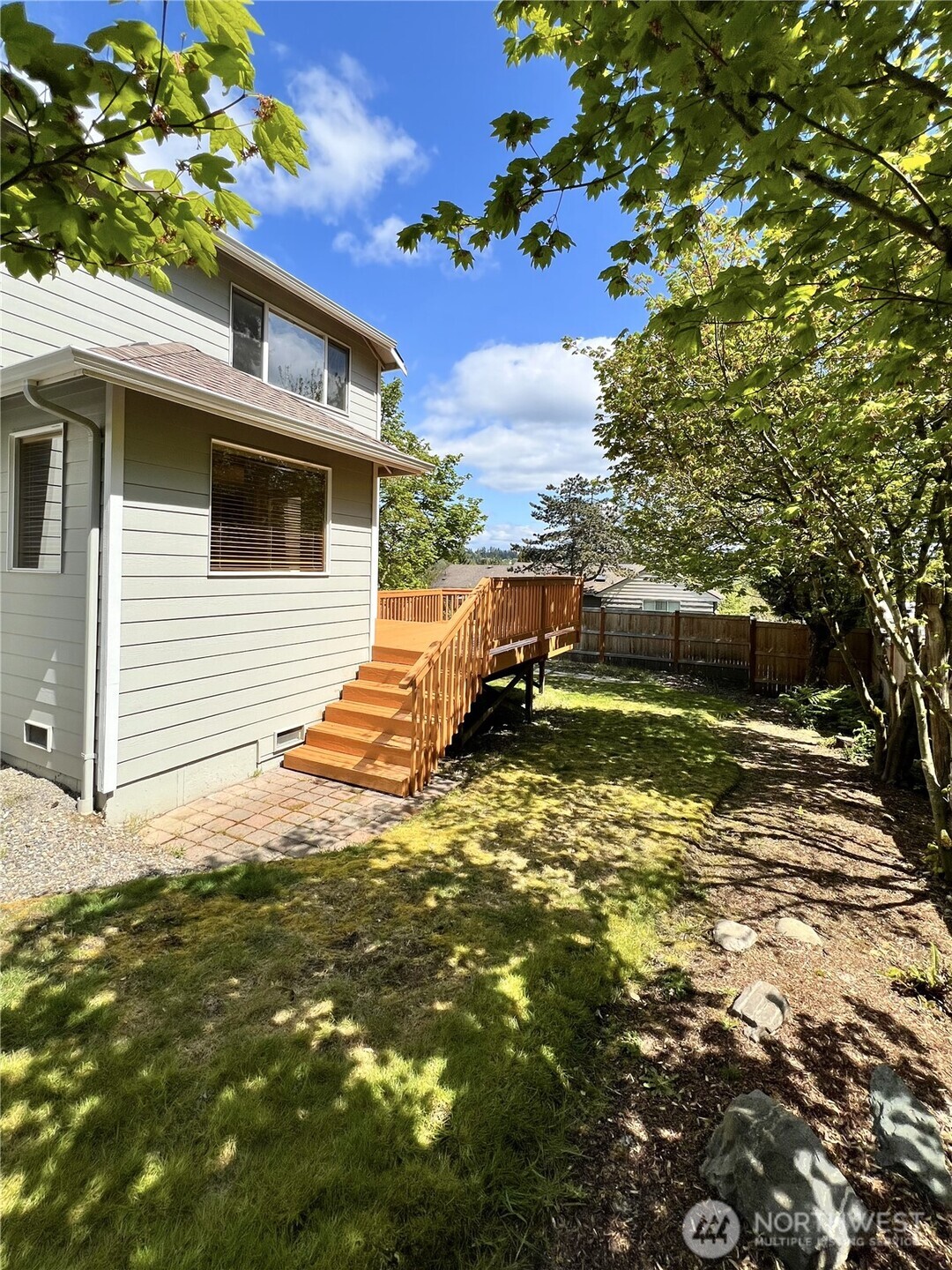132 170th Place Southeast Bothell, WA 98012 - Photo 24 of 27 a front view of a house with a yard