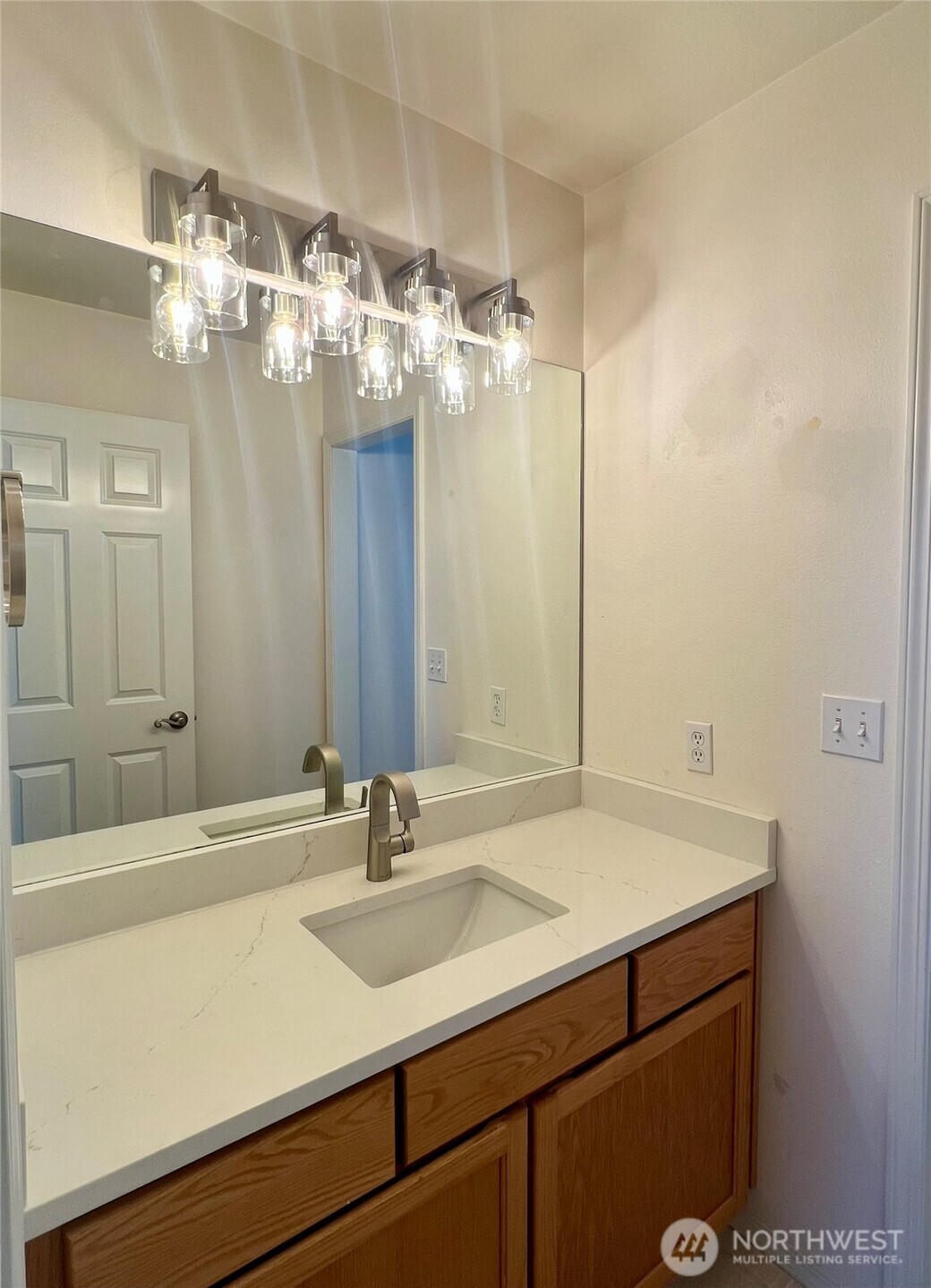 132 170th Place Southeast Bothell, WA 98012 - Photo 26 of 27 a bathroom with a sink and a mirror