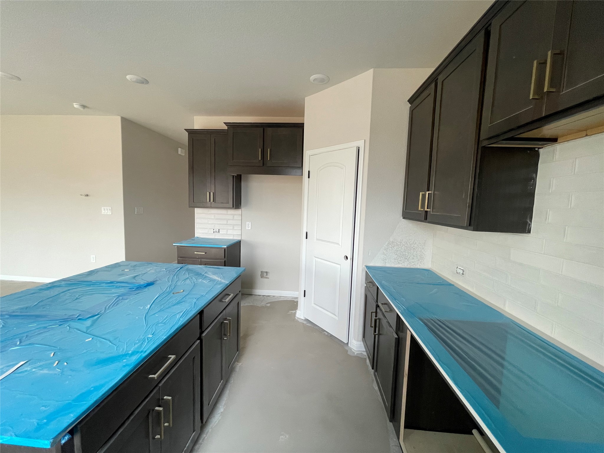 601 Palo Brea Loop Hutto, TX 78634 - Photo 19 of 39 a kitchen with stainless steel appliances cabinets and wooden floor