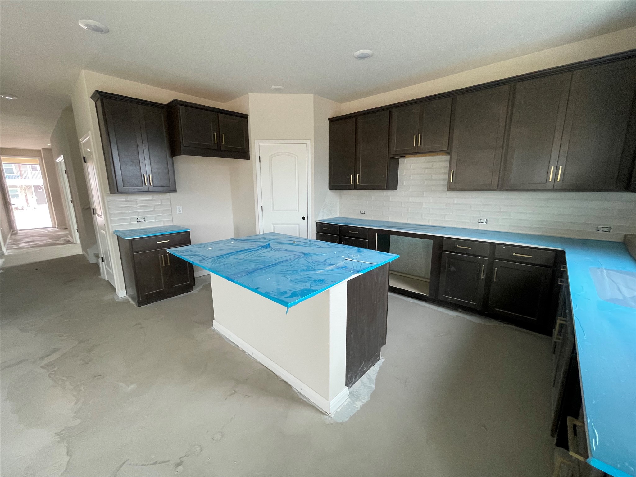 601 Palo Brea Loop Hutto, TX 78634 - Photo 21 of 39 a kitchen with stainless steel appliances granite countertop a sink stove and refrigerator