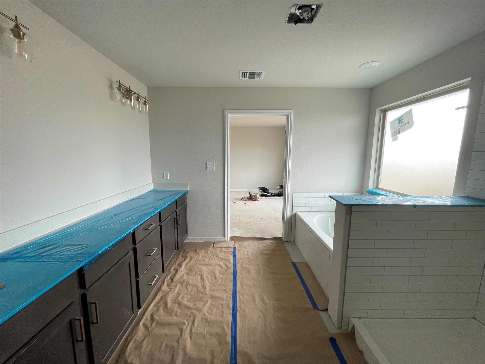 601 Palo Brea Loop Hutto, TX 78634 - Photo 27 of 39 a view of hallway with wooden floor