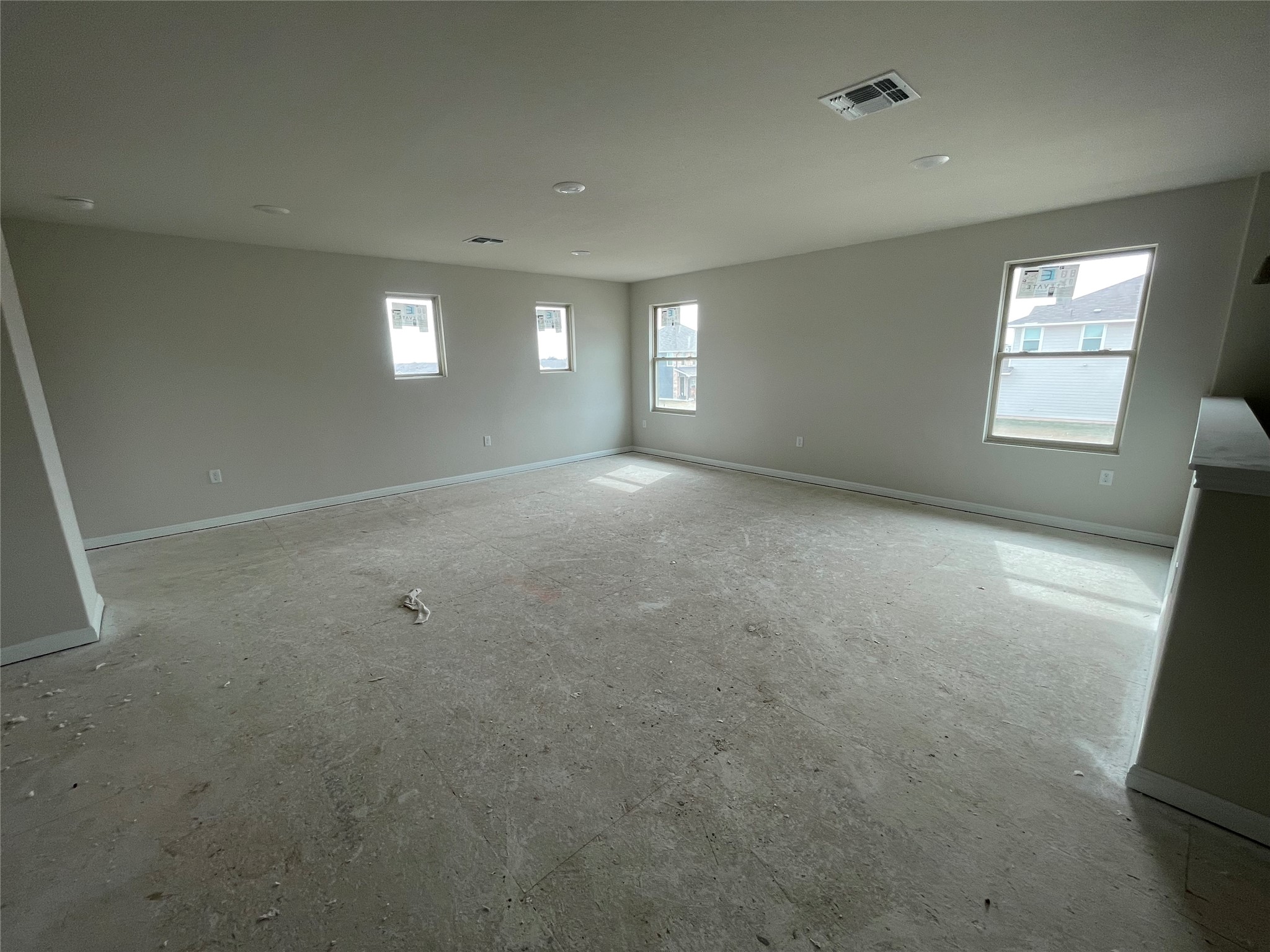 601 Palo Brea Loop Hutto, TX 78634 - Photo 28 of 39 an empty room with windows and closet
