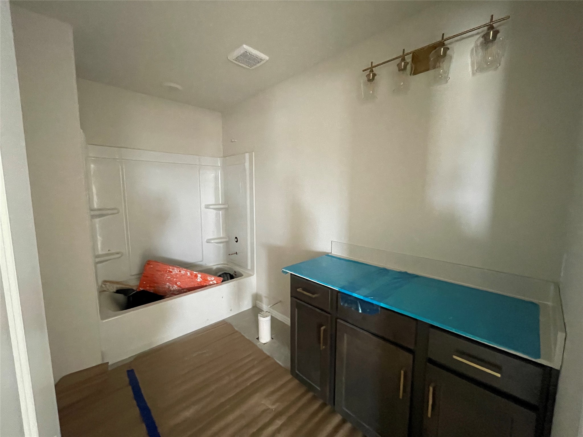 601 Palo Brea Loop Hutto, TX 78634 - Photo 31 of 39 a bathroom with a sink and shower