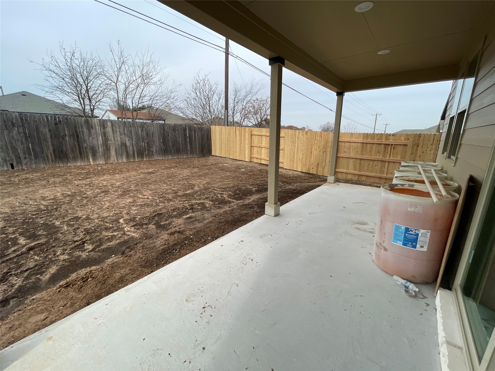 601 Palo Brea Loop Hutto, TX 78634 - Photo 39 of 39 a view of a back yard with a wooden fence